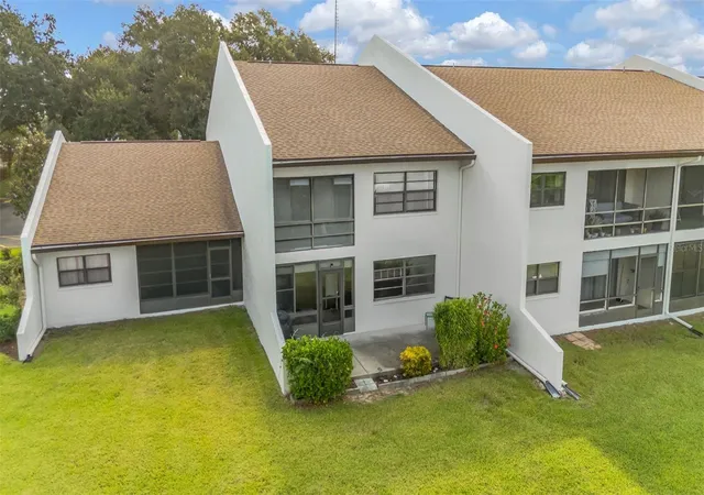 Listing Photo 2 - Condo for sale in building located at 7614 Radcliffe Cir, Port Richey, FL 34668 - Unit #B113