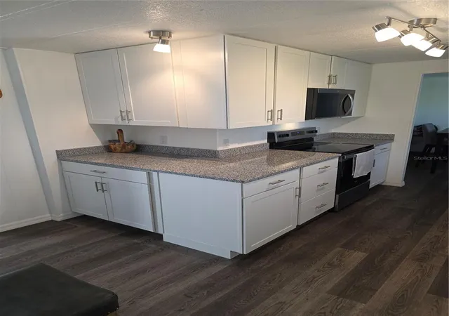 4th image of 102 Barefoot Trl, Port Orange, FL 32129 | MLS# W7888594