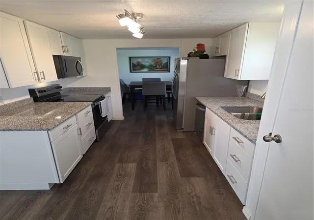 5th image of 102 Barefoot Trl, Port Orange, FL 32129 | MLS# W7888594