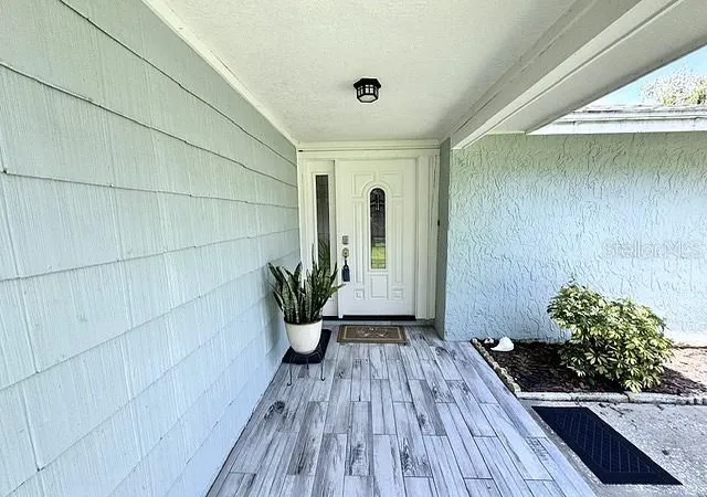 Photo 2 of Single family home for sale at 16004 Grass Lake Dr, Tampa, FL 33618 | MLS# TB8538906 | Listing updated on 2026-09-06