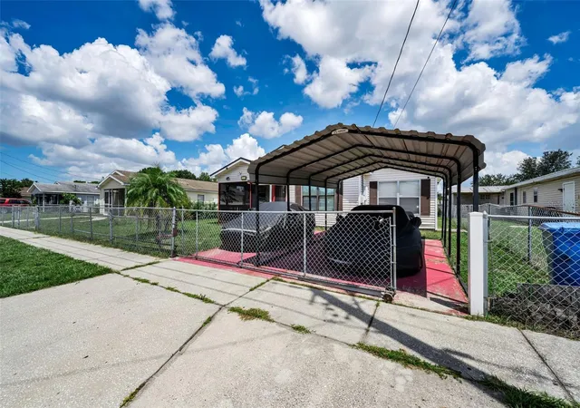 Photo 3 of Single family home for sale at 7526 Carolton Cir, Tampa, FL 33619 | MLS# A4702997 | Listing updated on 2026-08-17
