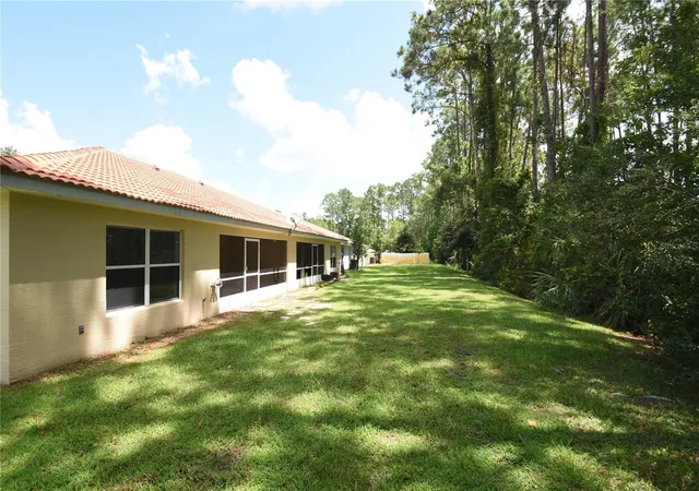 2nd image of 87 Pony Express Dr #A & B, Palm Coast, FL 32164 | MLS# FC320691