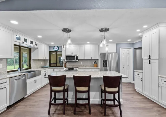 4th image of 6655 Millstone Dr, New Port Richey, FL 34655 | MLS# TB8539075