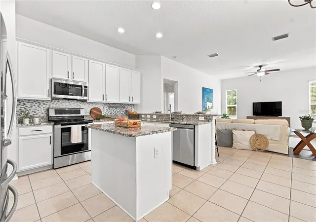Photo 3 of Single family home for sale at 5046 Silver Charm Ter, Wesley Chapel, FL 33544 | MLS# TB8539150 | Listing updated on 2026-09-08