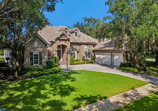 Photo 2 of Single family home for sale at 6102 S Hampshire Ct, Windermere, FL 34786 | MLS# O6434011 | Listing updated on 2026-08-19