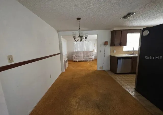 Photo 5 of Single family home for sale at 7639 Seashore Dr, Port Richey, FL 34668 | MLS# TB8539412 | Listing updated on 2026-09-02
