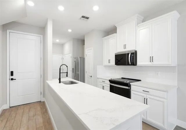 Photo 2 of Townhouse for sale at 5282 Neil Dr, Saint Petersburg, FL 33714 | MLS# TB8539459 | Listing updated on 2026-09-02