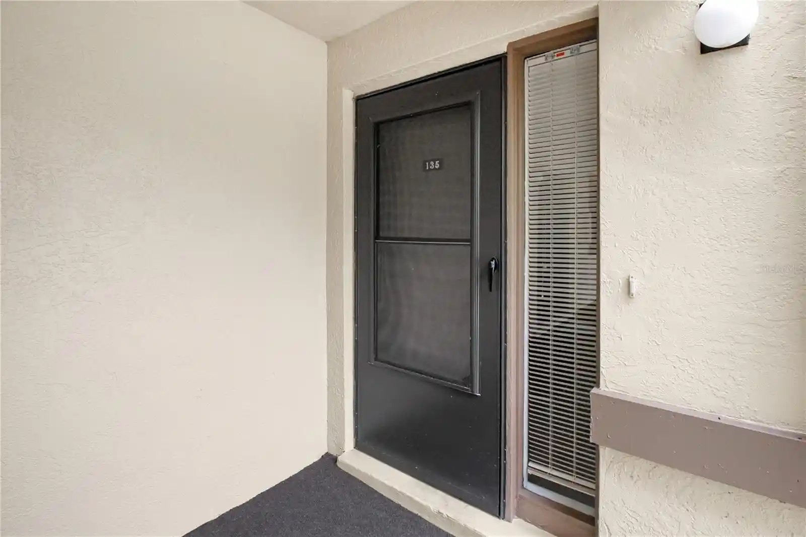Listing Photo 2 - Condo for sale in 135 Woodlake Wynde located at 135 Woodlake Wynde, OLDSMAR, FL 34677 - Unit #135