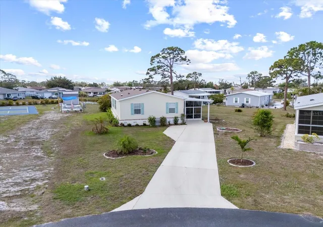 Photo 3 of Manufactured home for sale at 9182 Pinehaven Way, Englewood, FL 34224 | MLS# C7529655 | Listing updated on 2026-08-21