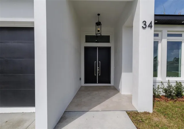 Photo 3 of Single family home for sale at 34 Fallen Oak Ln, Palm Coast, FL 32137 | MLS# FC320738 | Listing updated on 2026-09-24