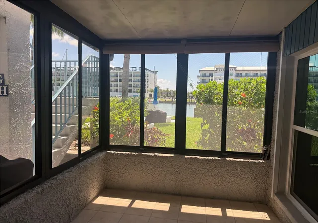 Listing Photo 4 - Condo for sale in building located at 179 Medallion Blvd, Madeira Beach, FL 33708 - Unit #D