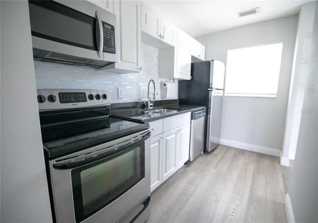 3rd image of 1831 Aaron Ave, Orlando, FL 32811 | MLS# S5155772