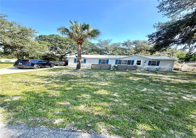 Photo 1 of Manufactured home for sale at 202 Ash St, Interlachen, FL 32148 | MLS# OM730564 | Listing updated on 2026-08-18