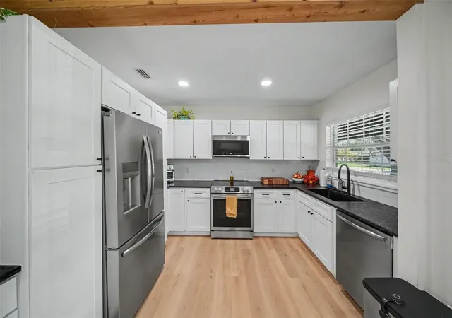 4th image of 4636 W Bay Court Ave, Tampa, FL 33611 | MLS# TB8539687