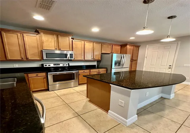 image of 10083 Eagle Creek Center Blvd, Orlando, FL 32832 | MLS# S5155790