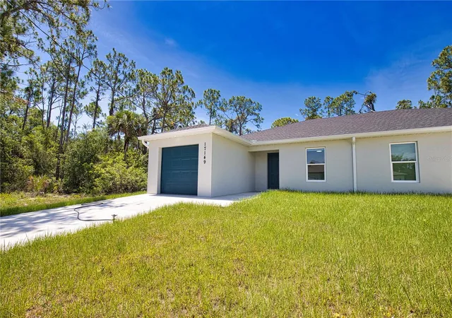 Listing Photo 3 - Condo for sale in building located at 17147 And 17149 Carleen Ave, PORT CHARLOTTE, FL 33948