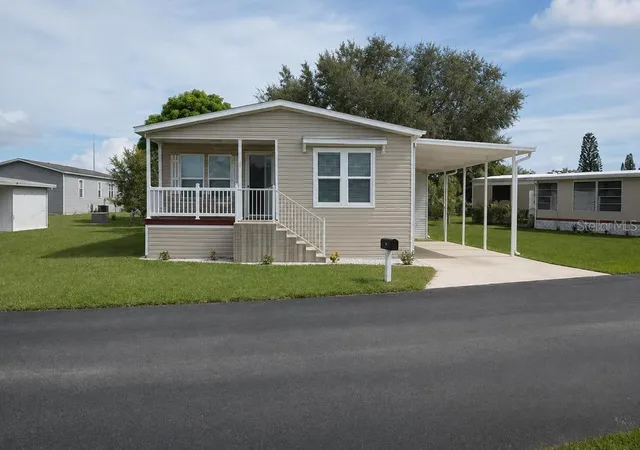 Photo 1 of Manufactured home for sale at 56 Manor Dr, Fort Pierce, FL 34982 | MLS# K4903713 | Listing updated on 2026-09-04