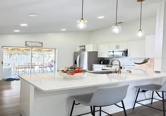 Photo 4 of Single family home for sale at 409 Talquin Ct, Orlando, FL 32807 | MLS# O6434344 | Listing updated on 2026-08-18
