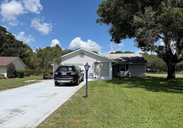 1st image of 1410 New Abbey Ave, Leesburg, FL 34788 | MLS# G5116578