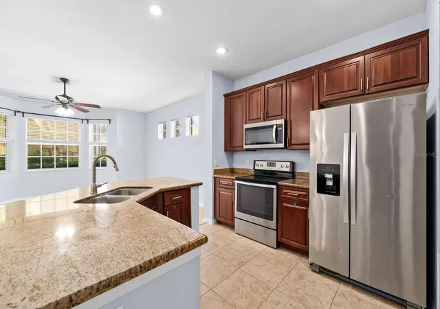 5th image of 7435 Arlington Grove Cir, Tampa, FL 33625 | MLS# TB8539852