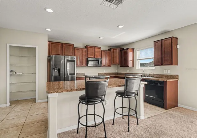 4th image of 2210 Purple Orchid Pl, Ruskin, FL 33570 | MLS# TB8539867