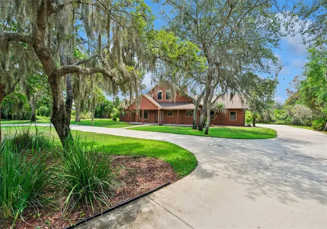 1st image of 15010 Mill Pond Rd, Tavares, FL 32778 | MLS# O6434487