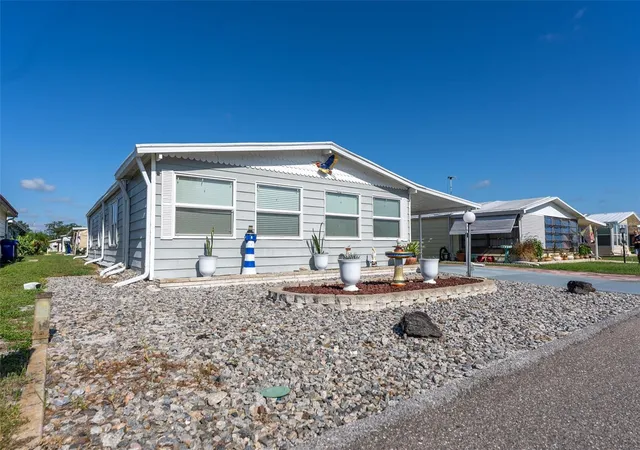 Photo 3 of Manufactured home for sale at 6703 Canterbury Dr Ne, Winter Haven, FL 33881 | MLS# P4939621 | Listing updated on 2026-08-26