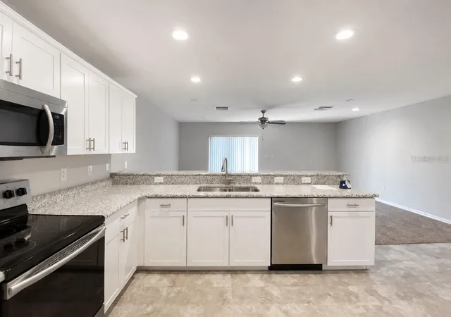 Photo 3 of Townhouse for sale at 7306 Merlot Sienna Ave, Gibsonton, FL 33534 | MLS# TB8540184 | Listing updated on 2026-08-19