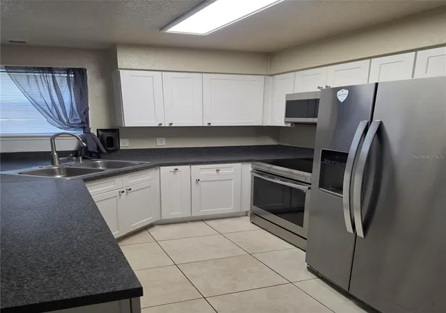 4th image of 3019 Antique Oaks Cir #127, Winter Park, FL 32792 | MLS# O6434819
