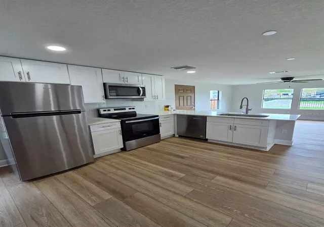 3rd image of 300 Eron Wy #1, Winter Garden, FL 34787 | MLS# O6434883