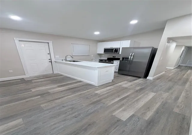Photo 4 of Single family home for sale at 927 Lakewood Ave, Tampa, FL 33613 | MLS# TB8540459 | Listing updated on 2026-09-30