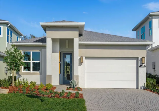 1st image of 545 Hammock Oaks Blvd, Lady Lake, FL 32159 | MLS# W7888746