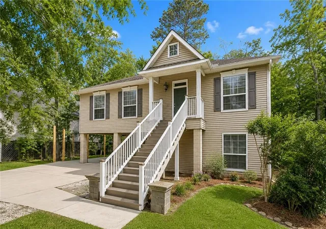 Photo 1 of Single family home for sale at 717 Woodridge Blvd, Mandeville, LA 70471 | MLS# 2552373 | Listing updated on 2026-08-24