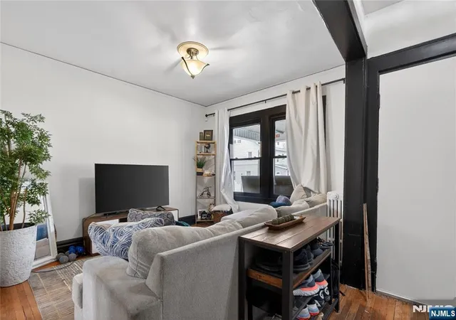 Photo 3 of Single family home for sale at 52 Clifford St, East Orange, NJ 07018 | MLS# 26014650 | Listing updated on 2026-08-28