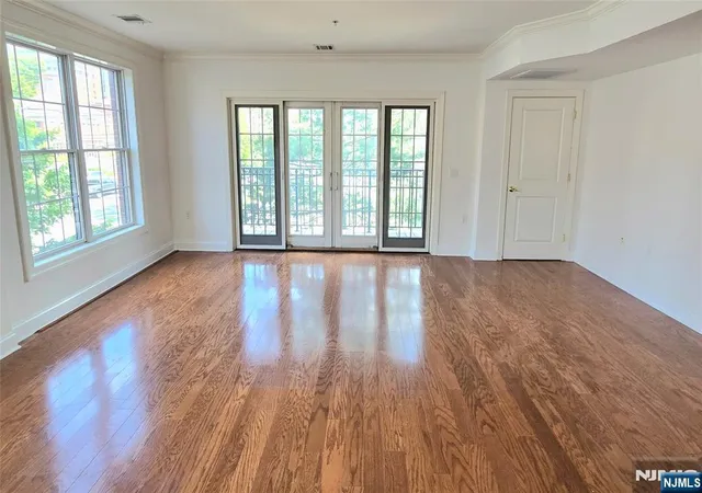 Photo 2 of Condo for sale at 54 Polifly Rd #201, Hackensack, NJ 07601 | MLS# 26016700 | Listing updated on 2026-09-10