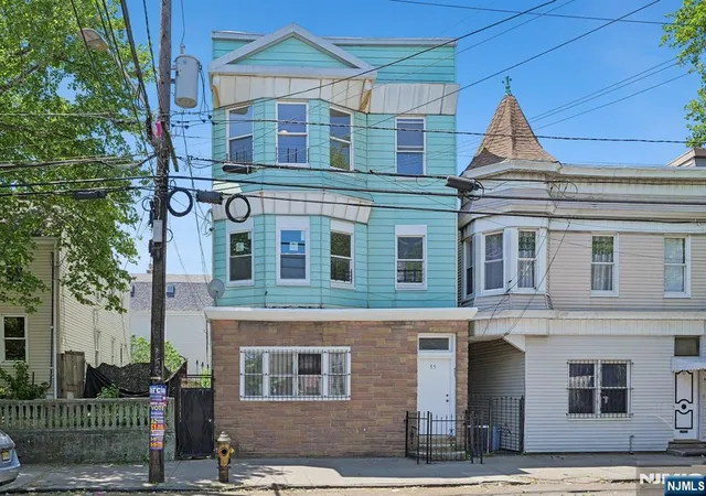 Photo 1 of Multi family home for sale at 55 Hawkins St, Newark, NJ 07105 | MLS# 26017726 | Listing updated on 2026-08-27