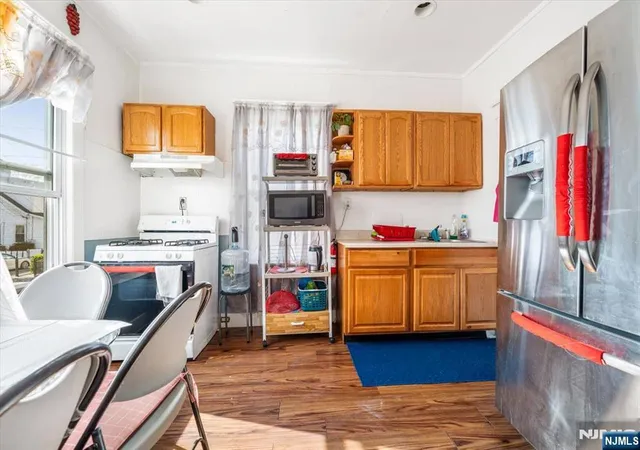 Photo 3 of Sale Pending at 217 Lily St, Paterson, NJ 07522 | MLS# 26018591 | Listing updated on 2026-09-08