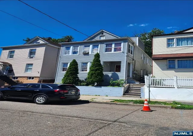 Multi family home for sale at 85 Tulip St, Passaic, NJ 07055 | MLS# 26022539