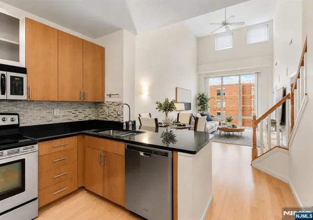Photo 1 of Condo for sale at 24 Ave At Port Imperial #404, West New York, NJ 07093 | MLS# 26022746 | Listing updated on 2026-09-18