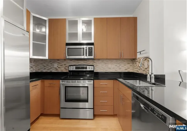 Photo 2 of Condo for sale at 24 Ave At Port Imperial #404, West New York, NJ 07093 | MLS# 26022746 | Listing updated on 2026-09-18