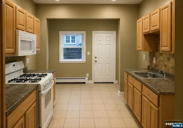 Photo 2 of Single family home for sale at 101 Columbia Ave, Newark, NJ 07106 | MLS# 26024299 | Listing updated on 2026-07-19