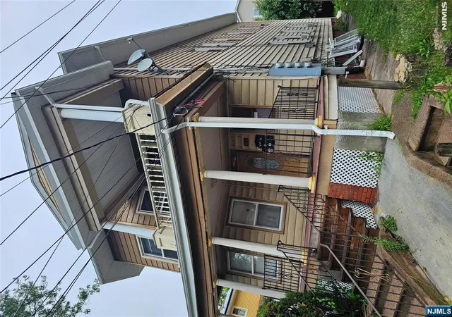 Photo 1 of Multi family home for sale at 673 25th St, Paterson, NJ 07504 | MLS# 26024455 | Listing updated on 2026-08-02