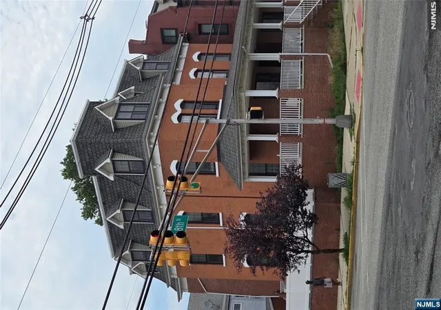 Single family home for sale at 105 8Th St, Bayonne, NJ 07002 | MLS# 26024919