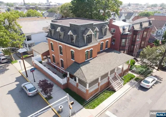 Photo 2 of Single family home for sale at 105 8th St, Bayonne, NJ 07002 | MLS# 26024919 | Listing updated on 2026-08-19