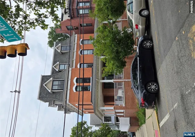 Photo 3 of Single family home for sale at 105 8Th St, Bayonne, NJ 07002 | MLS# 26024919 | Listing updated on 2026-08-19