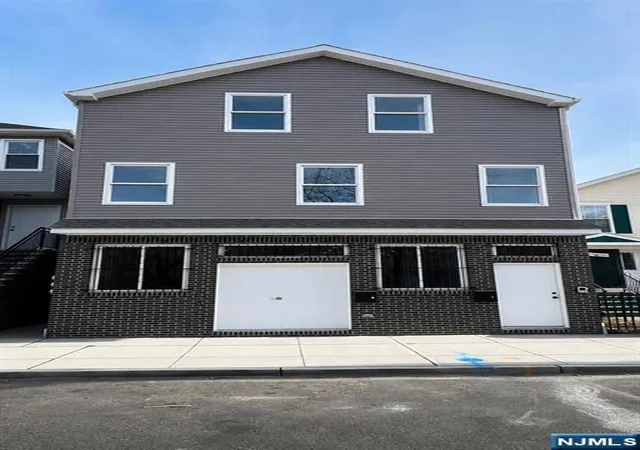 Photo 1 of Multi family home for sale at 52 Holland St, Newark, NJ 07103 | MLS# 26025373 | Listing updated on 2026-09-09