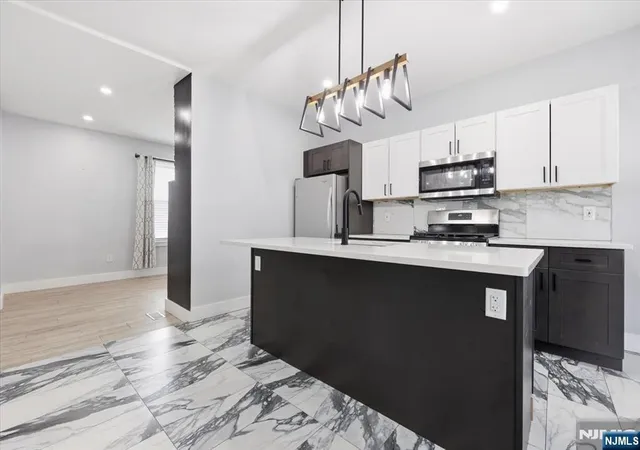 Photo 3 of Sale Pending at 24 Kingsley St, West Orange, NJ 07052 | MLS# 26025990 | Listing updated on 2026-08-07