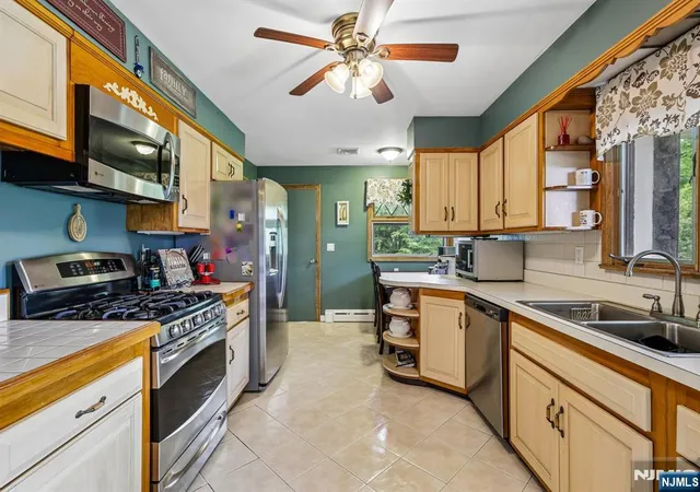 Photo 3 of House for sale at 695 Berdan Ave, Wayne, NJ 07470 | MLS# 26026438 | Listing updated on 2026-10-05