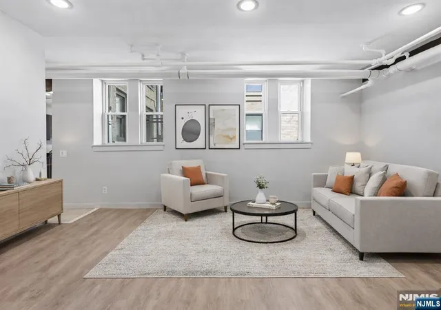 Listing Photo 1 - Condo for sale in building located at 50 Reservoir Ave, Jersey City, NJ 07307 - Unit #B1