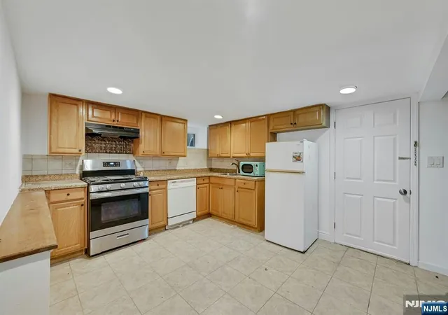 Photo 3 of Multi family home for sale at 8804 3rd Ave, North Bergen, NJ 07047 | MLS# 26027294 | Listing updated on 2026-09-13